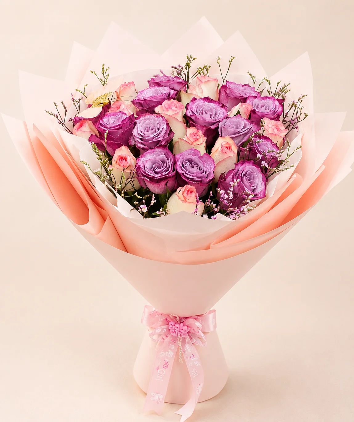 A lavish combination of pink and purple roses, creating a beautiful balance of romance, richness, and elegance