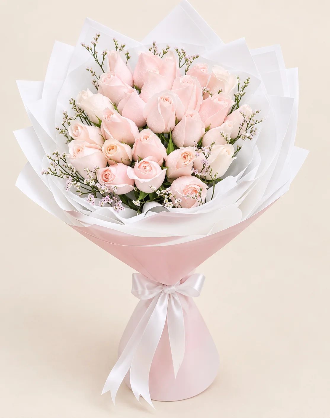Soft, elegant roses in delicate pastel tones, beautifully arranged for a romantic and graceful presentation.