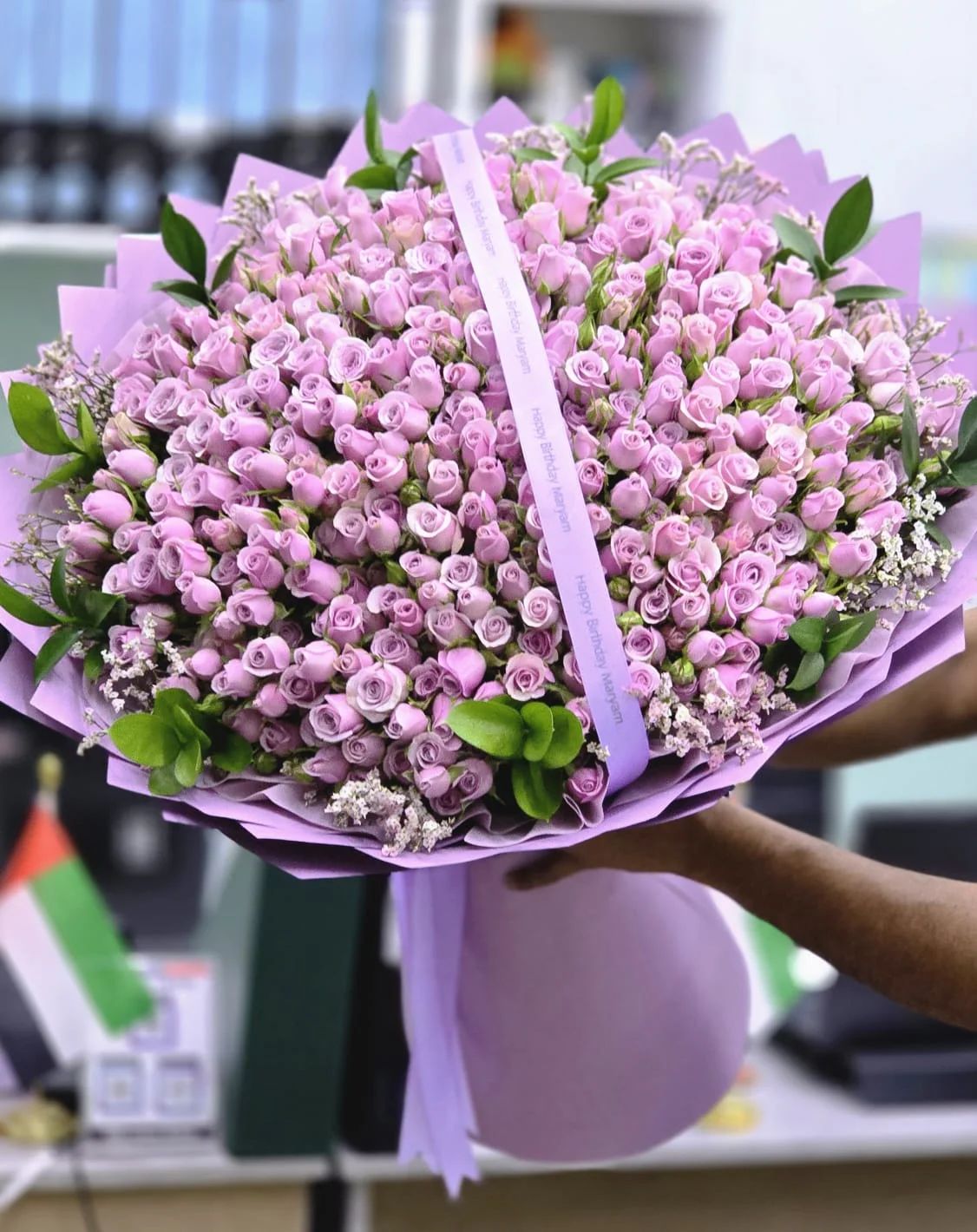 An elegant bouquet of soft lavender roses arranged in a graceful premium style.